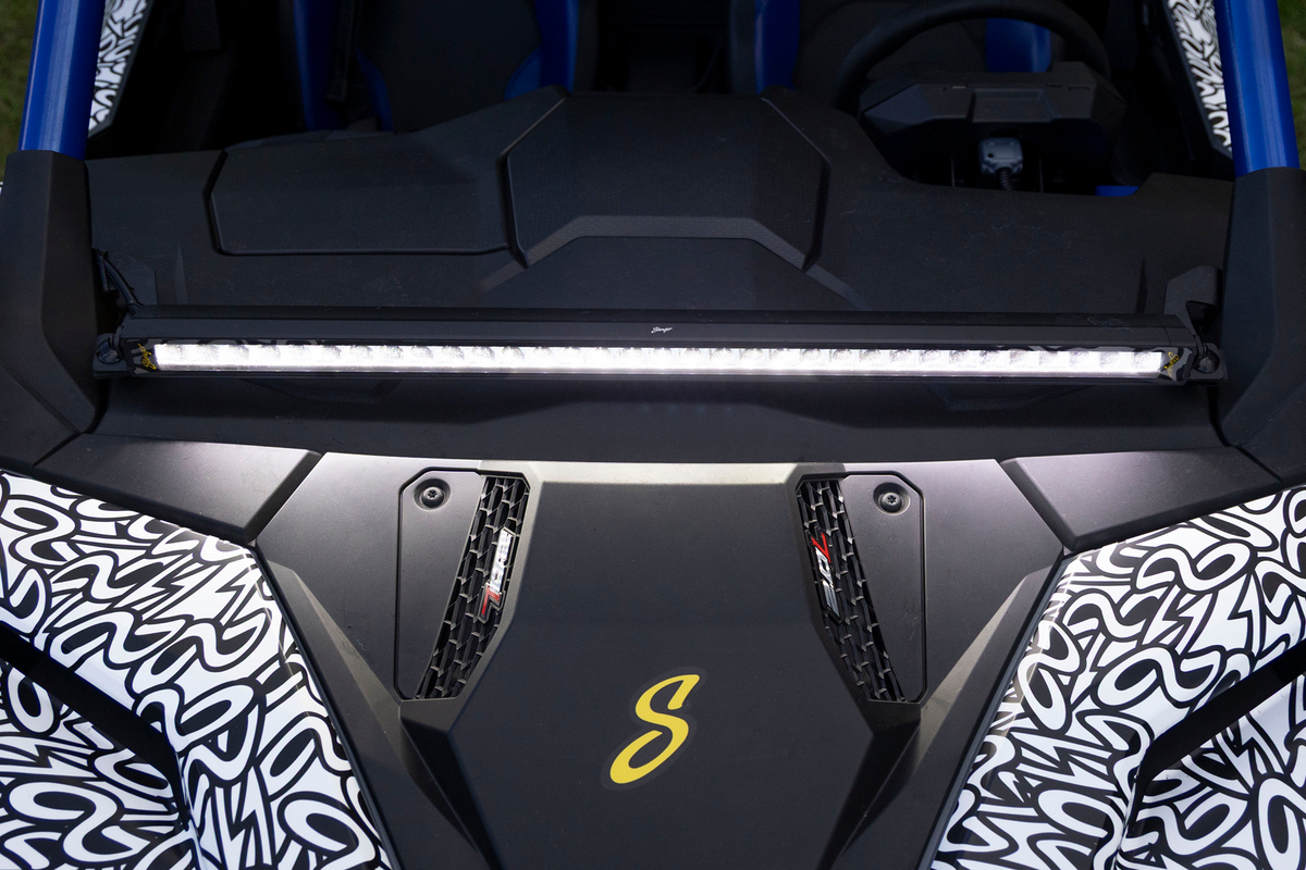 Stinger LED light bar mounted on a vehicle hood