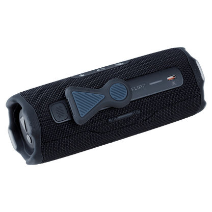 Black JBL Flip 7 Bluetooth speaker with JBL MAG magnetic mount attached