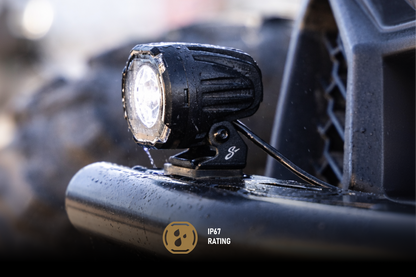 Stinger LED pod light mounted on a vehicle bumper with IP67 water resistance rating