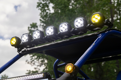 Stinger LED light bar mounted on a blue off-road vehicle roll cage